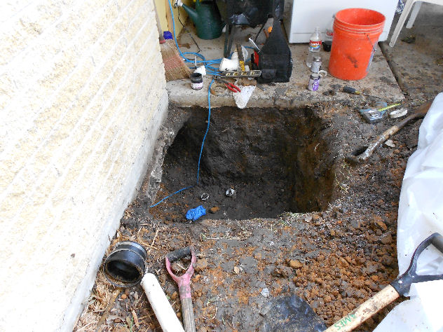 Photo of tunnel dug to access slab leak